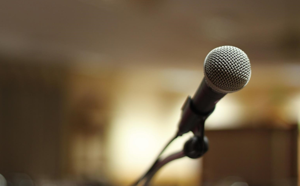 close-up-of-microphone-against-blurry-background