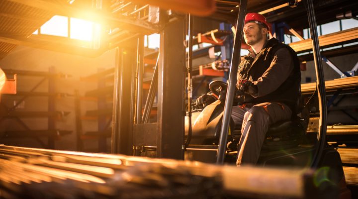 man-driving-forklift-in-workplace