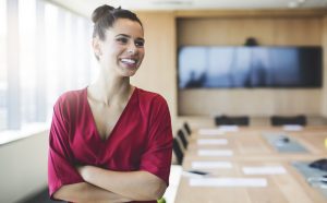 smiling-woman-in-conference-room